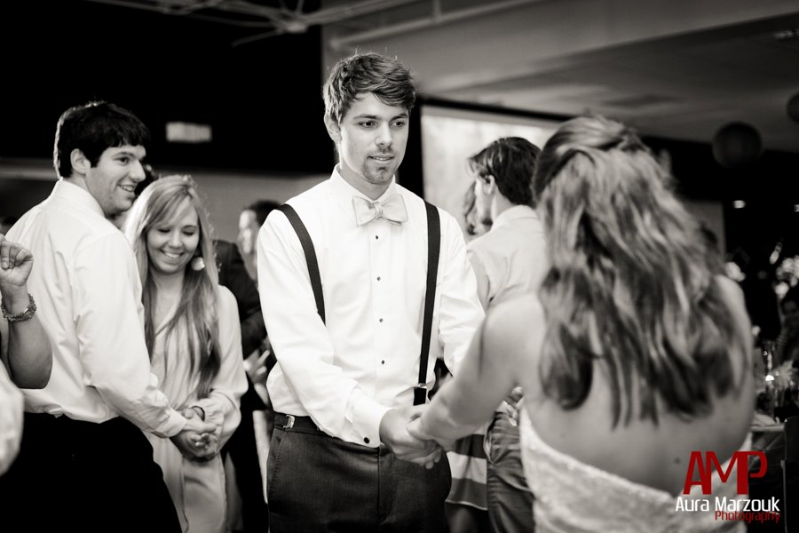 Black and white image of reception dancing by Winston Salem rustic wedding photographer Aura Marzouk