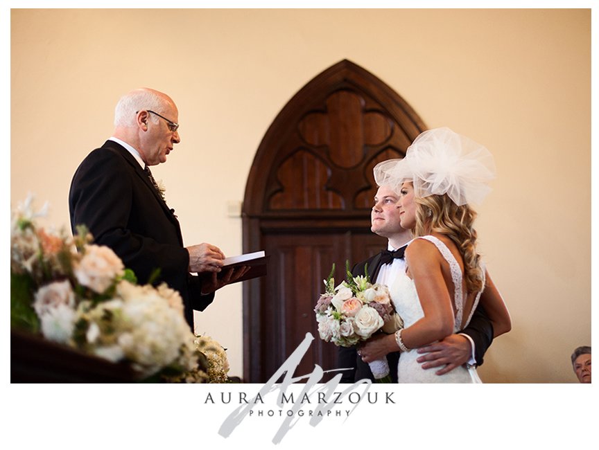 Jessica and chad say their vows at their Mint Museum Wedding in Charlotte, NC. © Aura Marzouk Photography, Greensboro Wedding Photographer