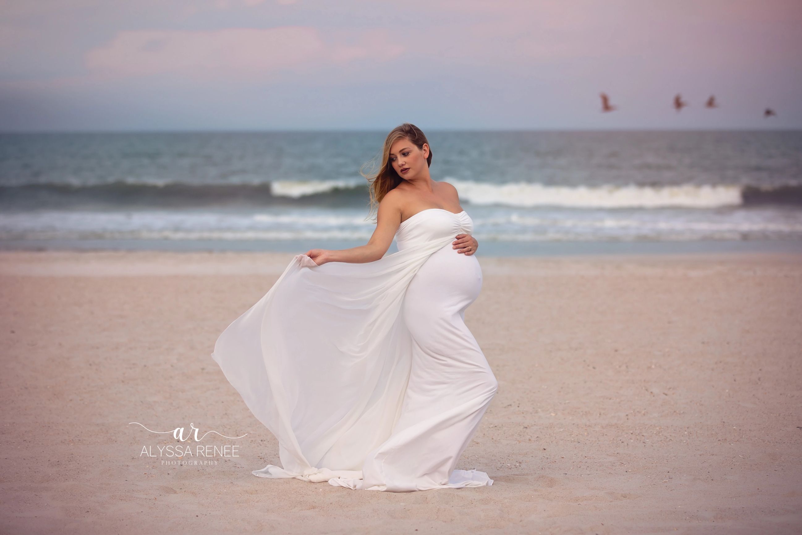 Beach pregnancy photos in Jacksonville florida by Alyssa Renee Photography