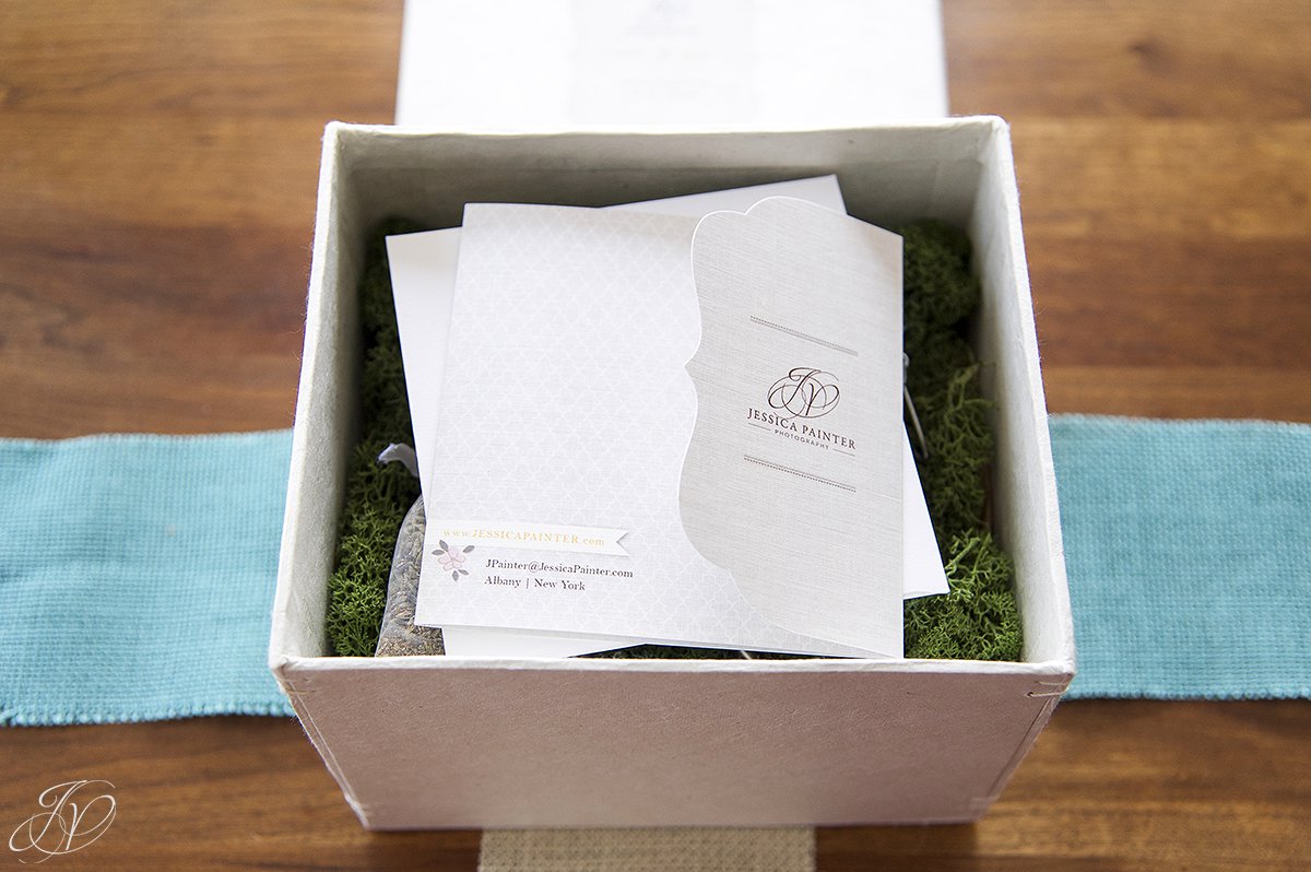 loktah box with thank you card, reindeer moss inside of loktah box, custom wedding packaging, personalized wedding photography packaging, unique wedding photography packaging