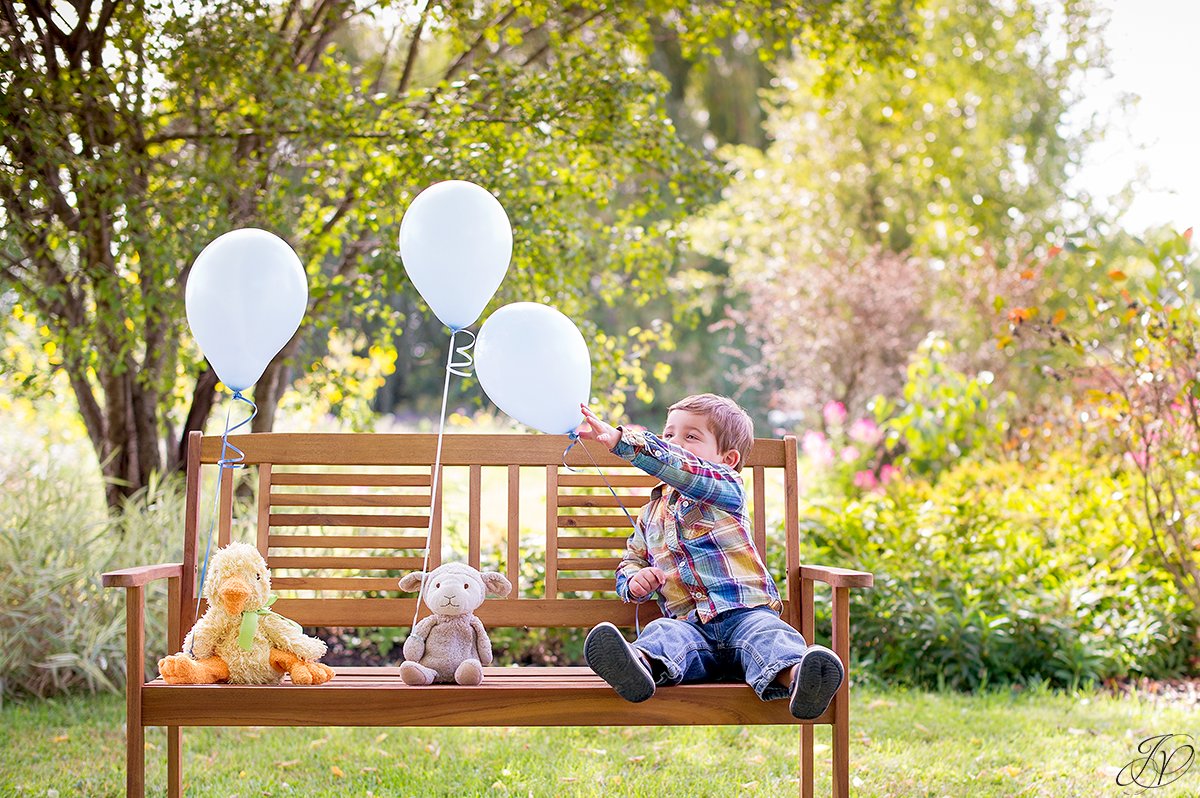 two year old portrait session balloons children