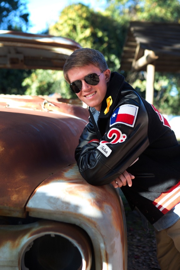 high-school-boy-senior-photos-houston-football-letter-jacket-The-Shack