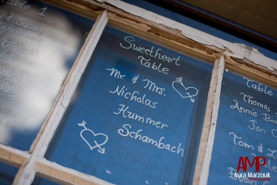 Vintage window pane escort cards at this Winston Salem wedding. © Aura Marzouk Photography