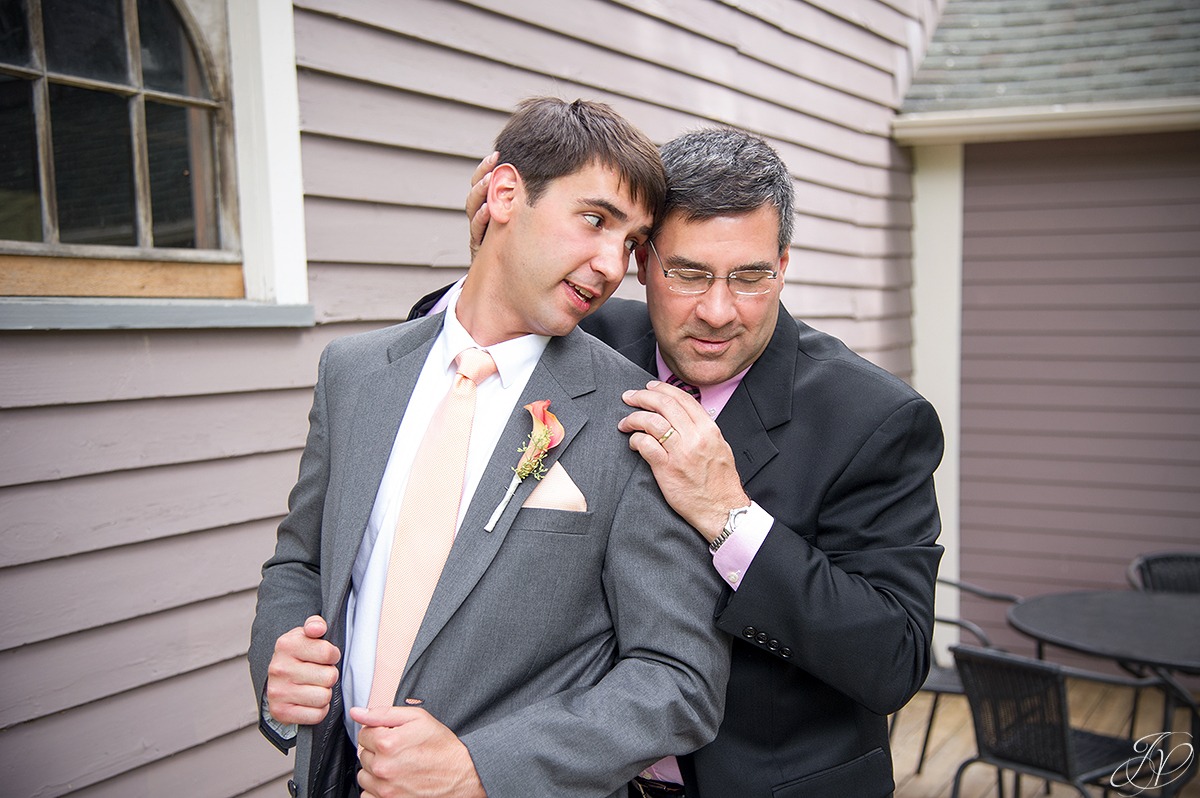 emotional moment between groom and his father before ceremony