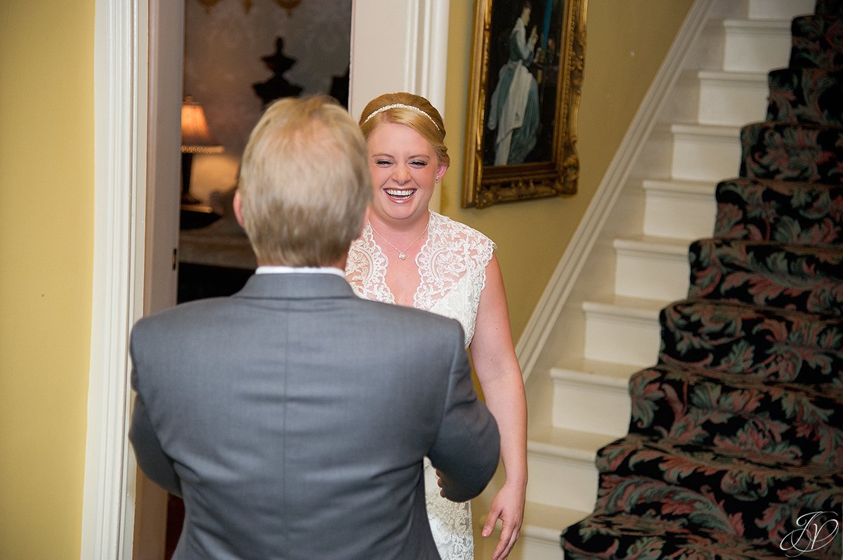 happy moment during father daughter first look