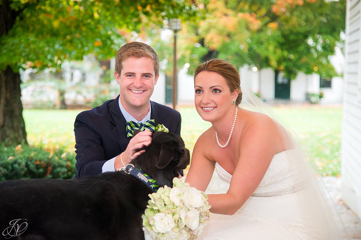 cute photo of bride and groom with their dog