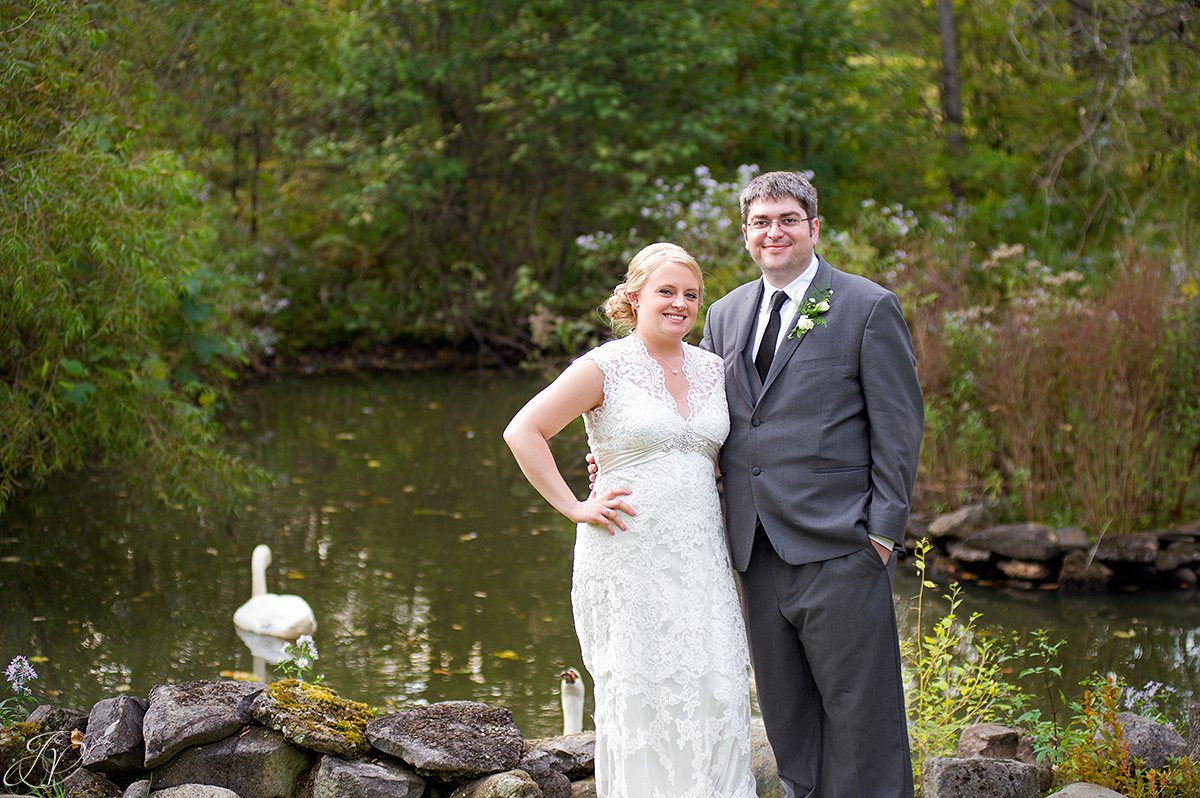 vintage photo of bride and groom in front of pond