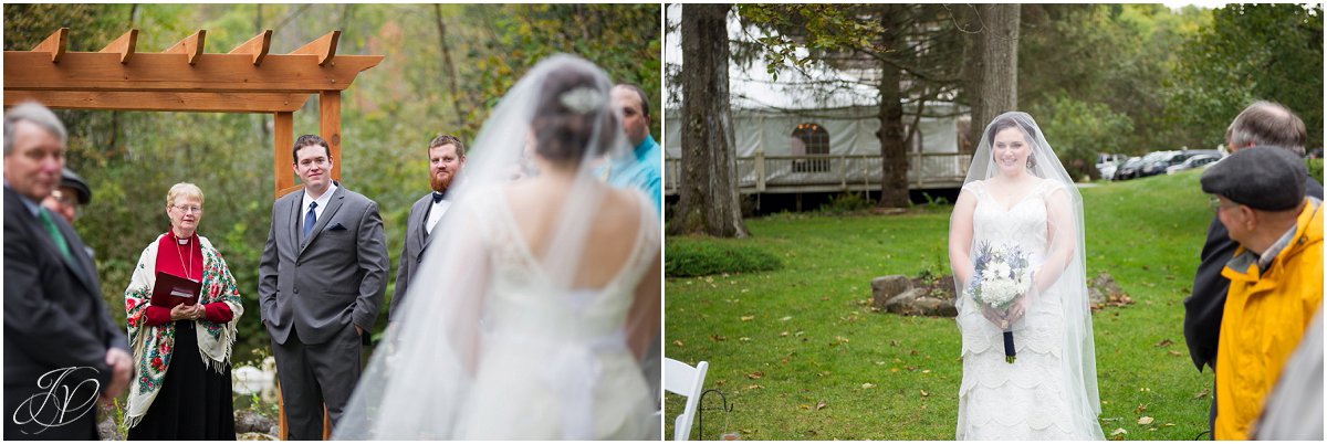 bride walks down the aisle alone flowing veil