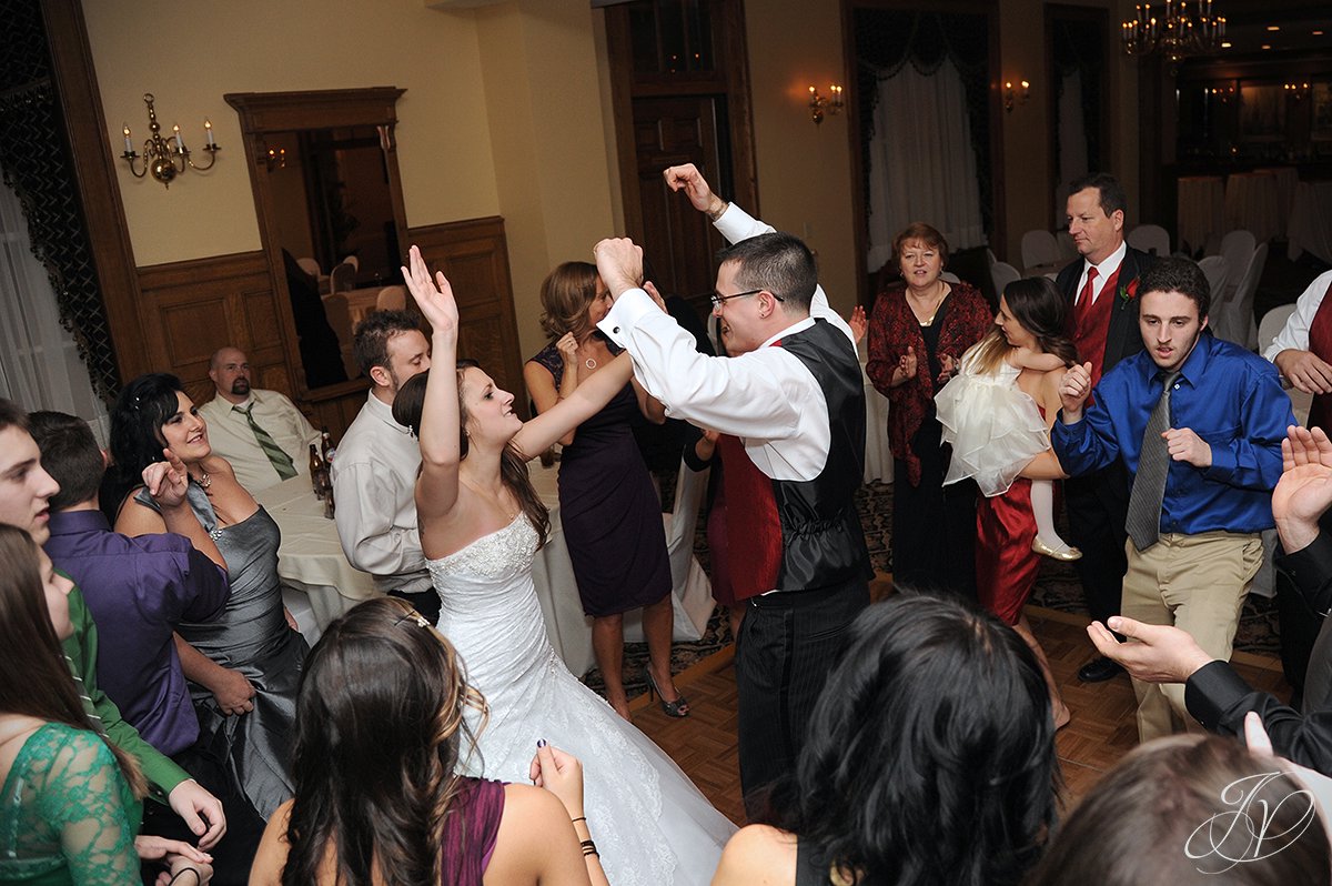 bride and groom dancing, bride partying photo, bride dancing candid, Schenectady Wedding Photographer, The Stockade Inn, Reception candid photos, guests dancing candids, reception at the stockade inn