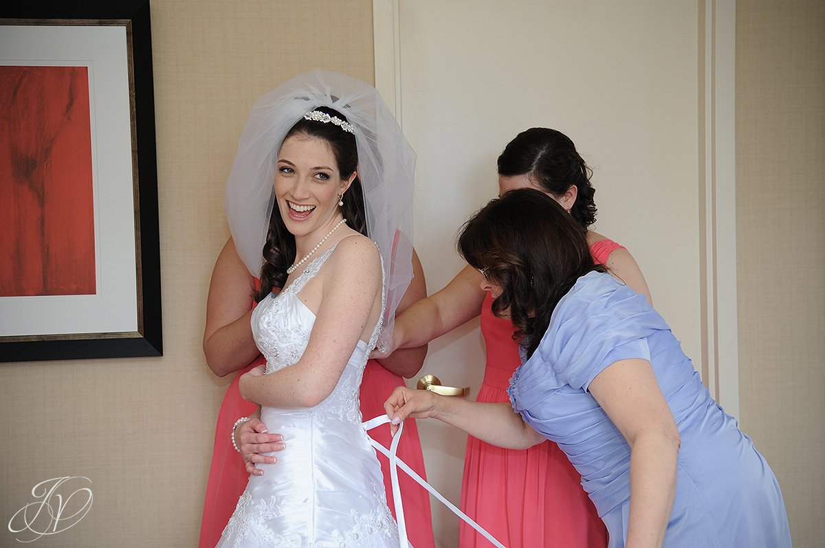 bride getting laced up, beautiful bride photo, Saratoga Wedding Photographer, The Canfield Casino wedding, wedding detail photo, pre wedding photos