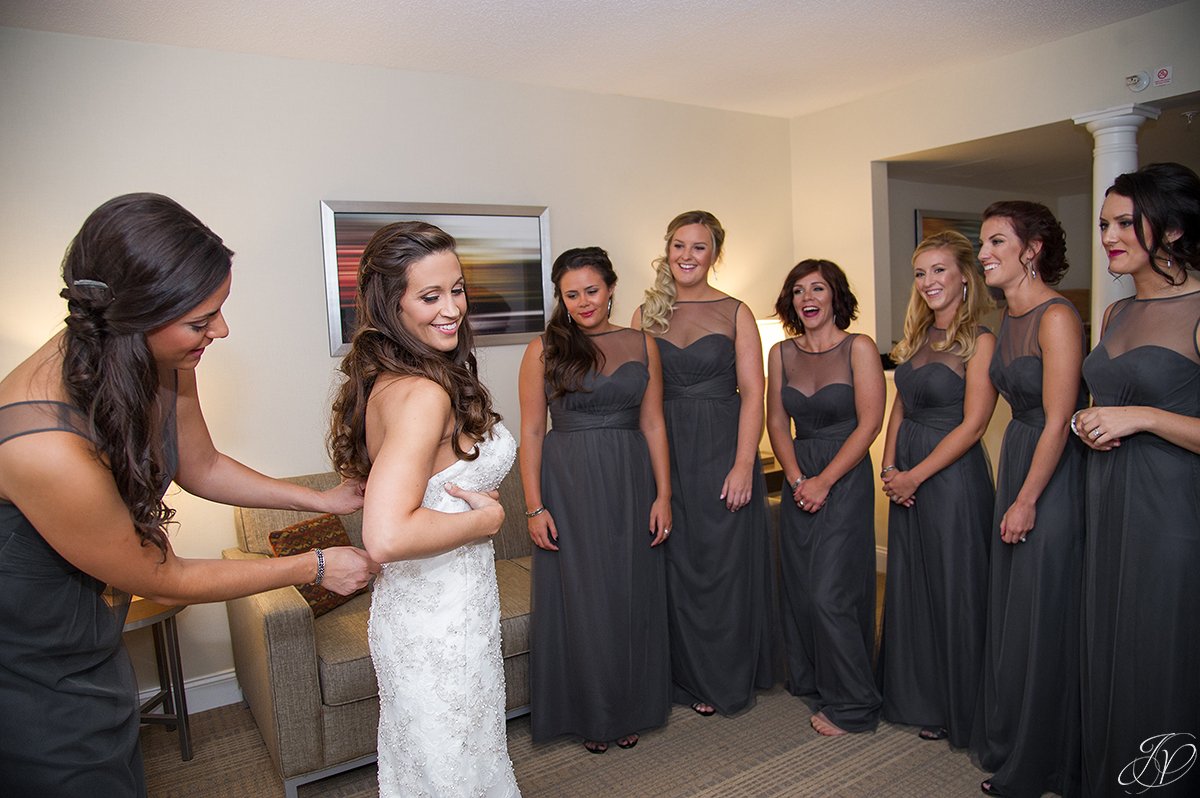 bride getting ready with bridesmaids