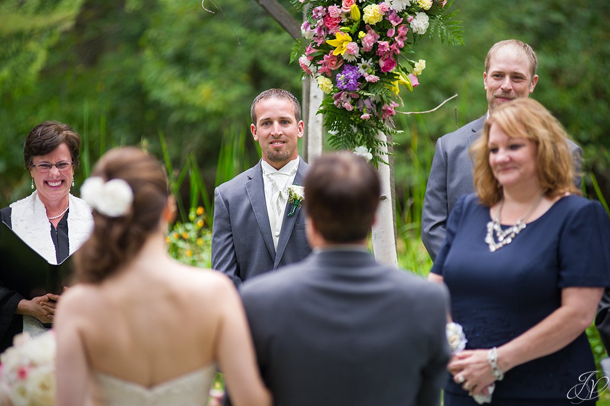 emotional bride and groom first glance during ceremony