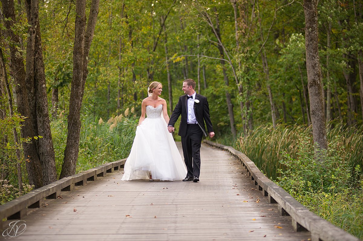 bride and groom on bridge walkway saratoga national