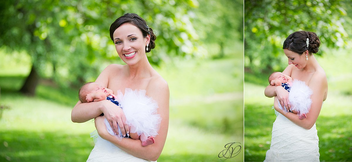 cute shot of bride with her newborn baby niece