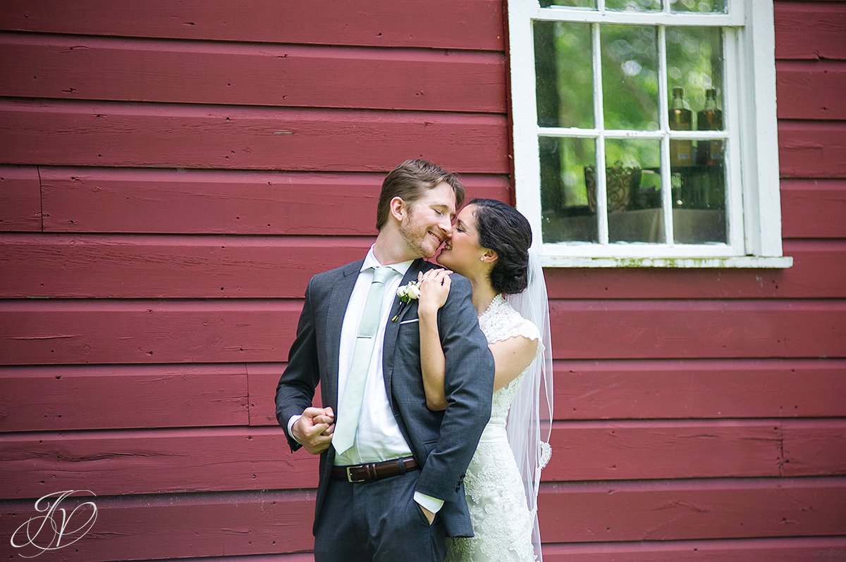 beautiful bride and groom candid, bride and groom in front of barn, first look at pruyn house, bride and groom portrait, pruyn house wedding, Wedding at The Pruyn House, Albany Wedding Photographer