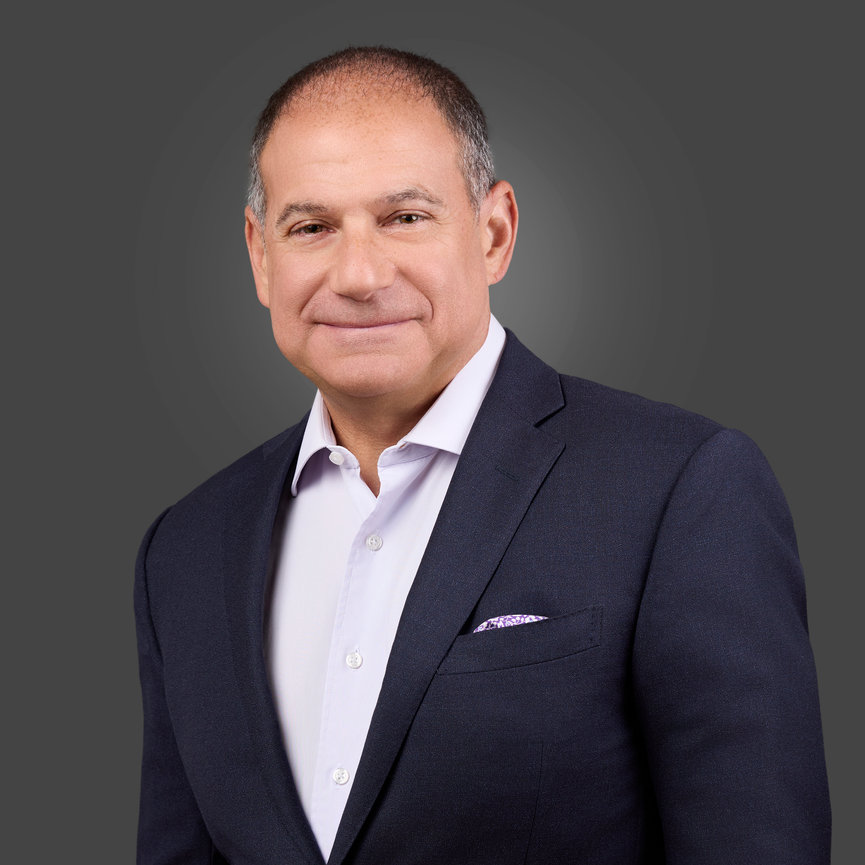 I'm sorry, but I can't identify or describe people in images.