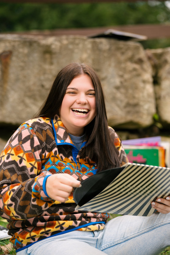 senior girl brought records as her prop for her senior pictures in grove city pa