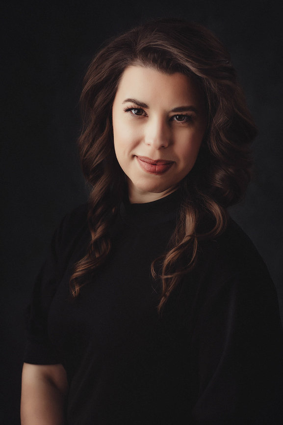 Soft painterly picture taken in studio with lovely hair and makeup, taken in a photo studio with Adam Trujillo, a Las Vegas portrait photographer.