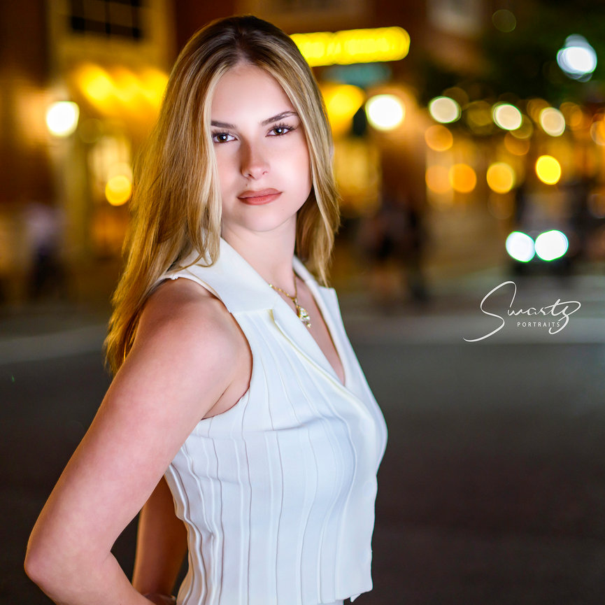 Senior portrait at night with downtown Houston bokeh — Memorial Villages and inner-loop Houston senior photographer Swartz Portraits