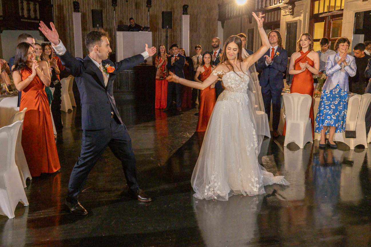 Wedding guests celebrating together at the reception