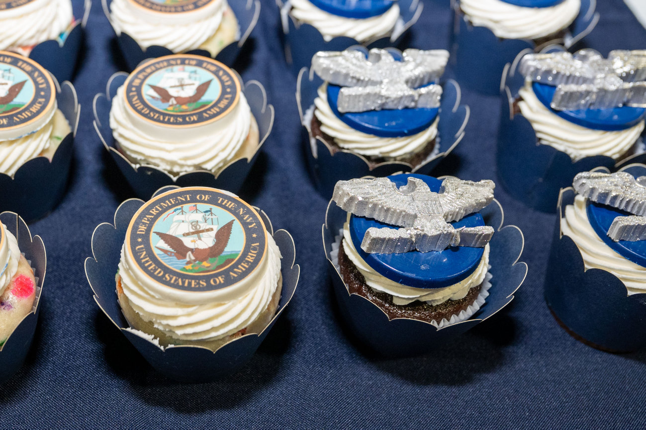 cupcakes on display at a Navy retirement ceremony photographed by Laura Hatcher Photography