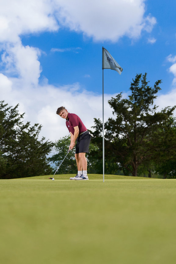 High school senior portraits in Sherman TX showcasing personality including golf course lifestyle portraits