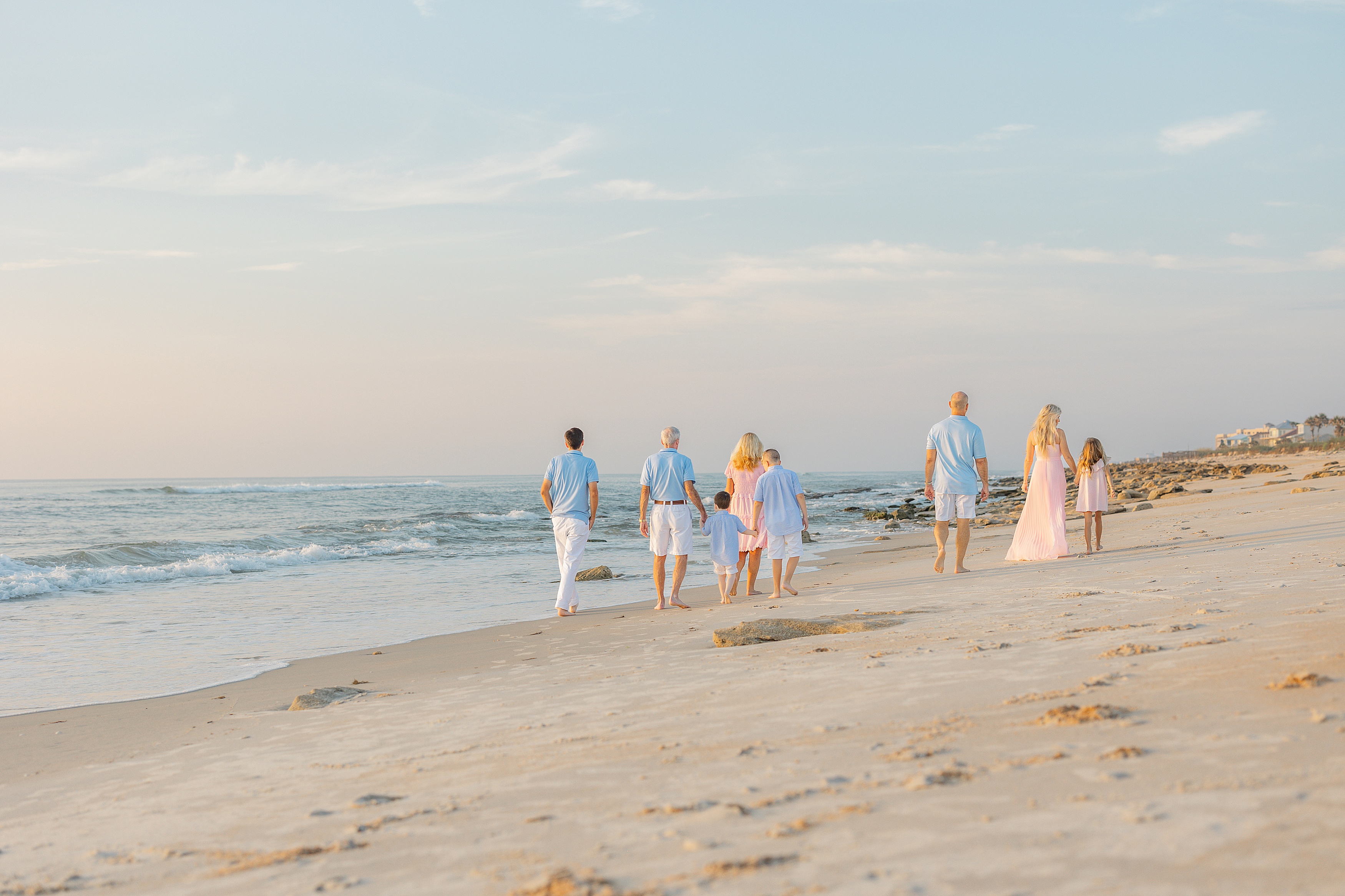 Sunrise extended family beach portraits in Saint Augustine.