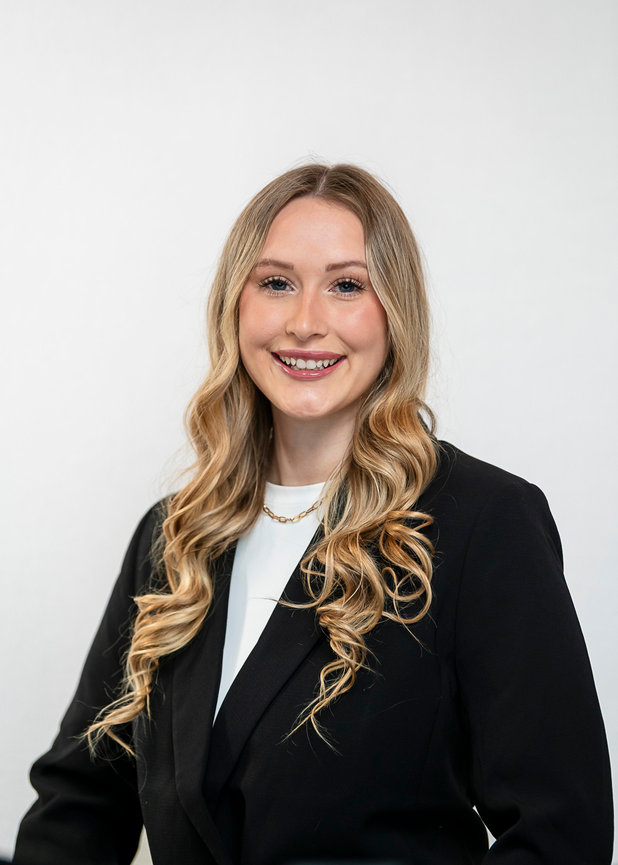 Female headshot on white backdrop.