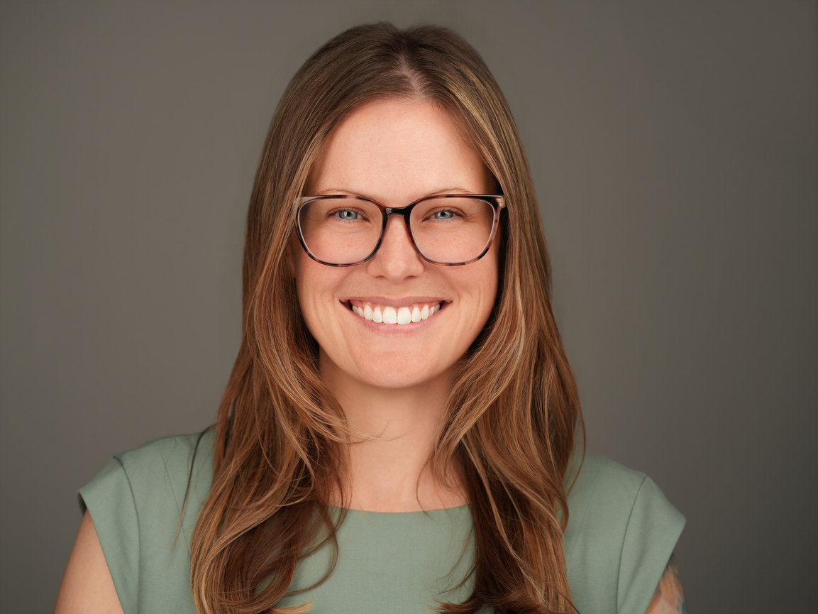 Executive-style professional headshot with studio lighting used for LinkedIn and corporate branding