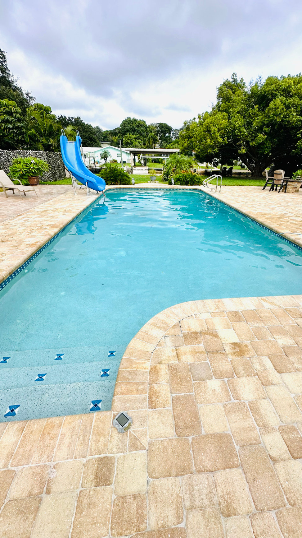 Clean blue pool after professional pool treatment