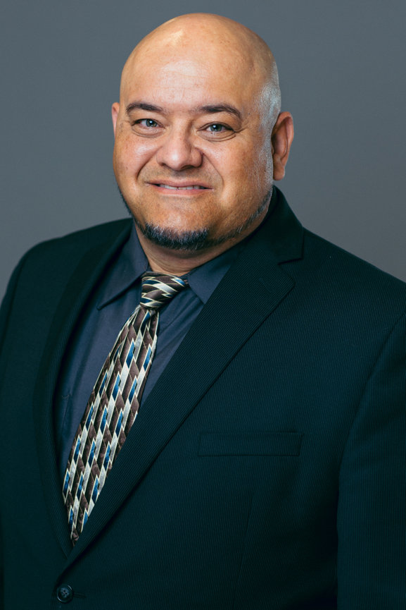 Medical provider business portrait in with gray backdrop