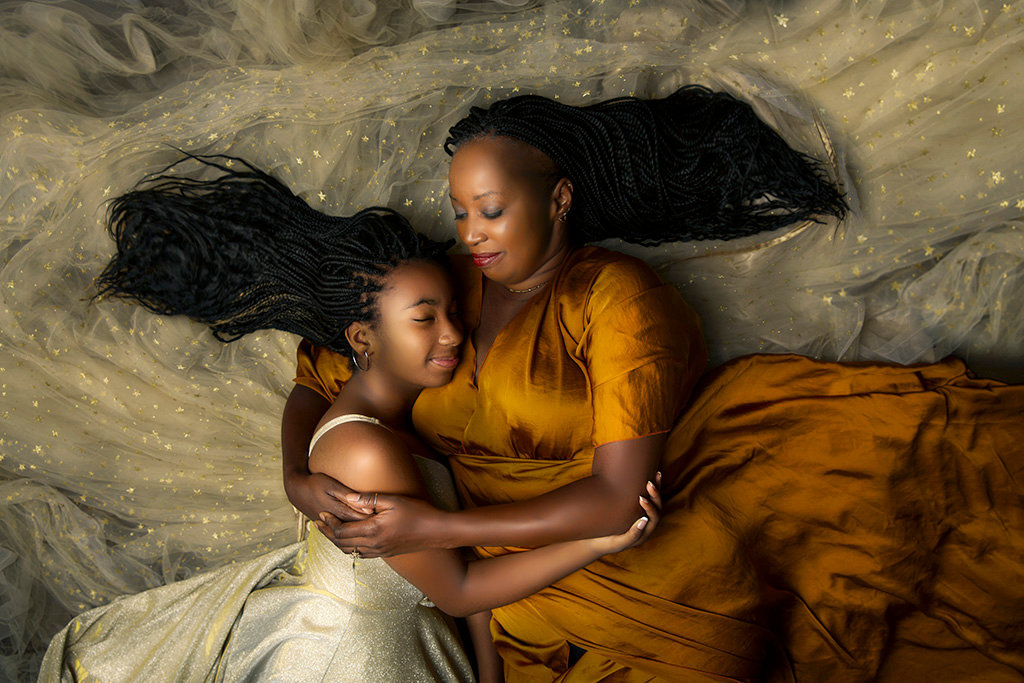 Artistic mother and child portrait session in Fort Worth studio, highlighting connection and warmth.