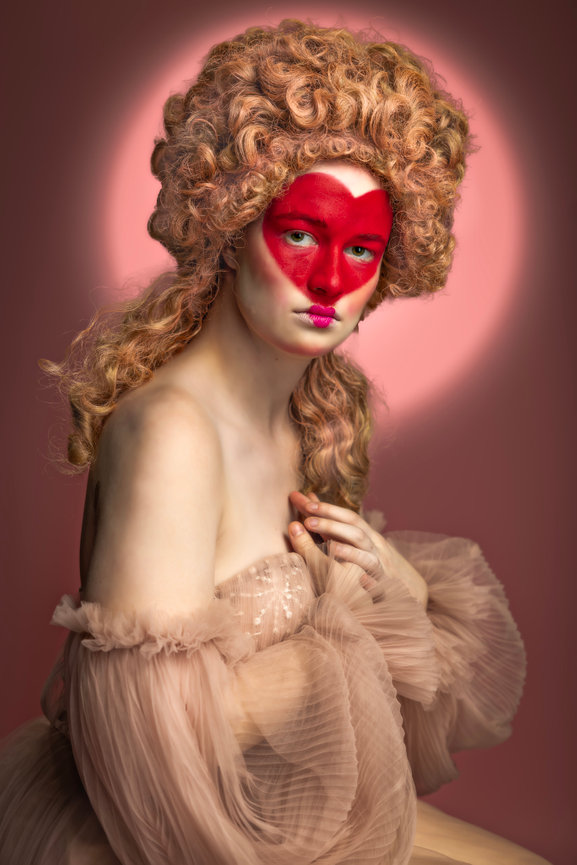 Studio creative portrait with red heart face paint and couture gown, Fort Worth fine art editorial photographer