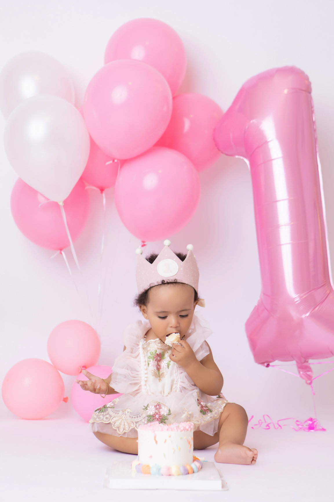 Calgary cake smash photography pink balloons tulle and bubbles first birthday session photo 19