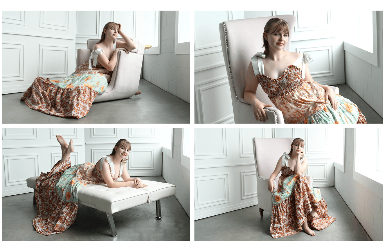 High school senior, Evelyn, wearing a long floral gown while sitting in a pink velvet chair.