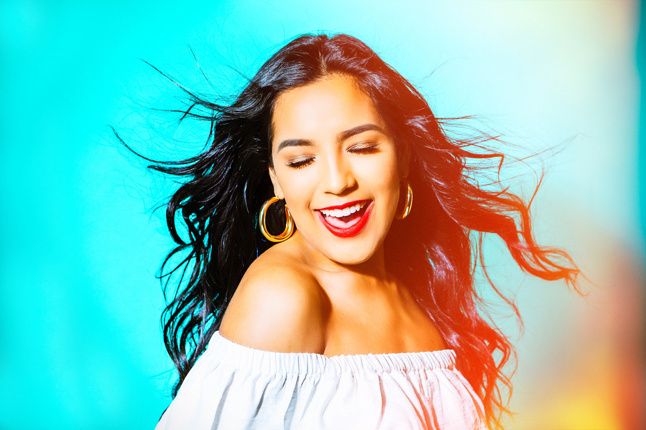 Jami Scull Photography Studio session for a senior girl using a fan to blow her hair